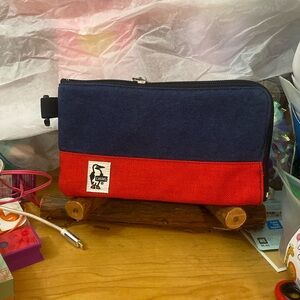 Chums canvas suede pouch red and blue 7 3/4 inches wide and 4 inches height